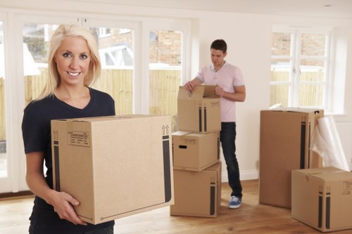 Professional local removals in Yiewsley with packed boxes and moving van