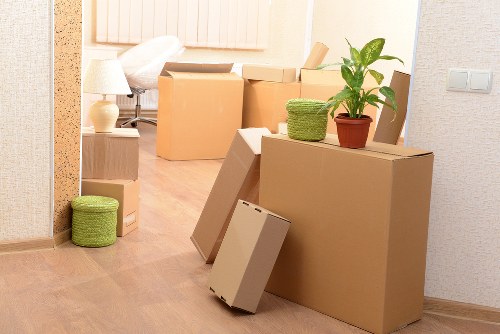 Organised short-term storage unit with boxes and furniture