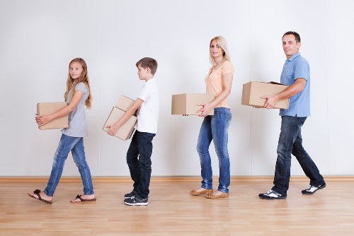 Home relocation team handling furniture during removals in Yiewsley